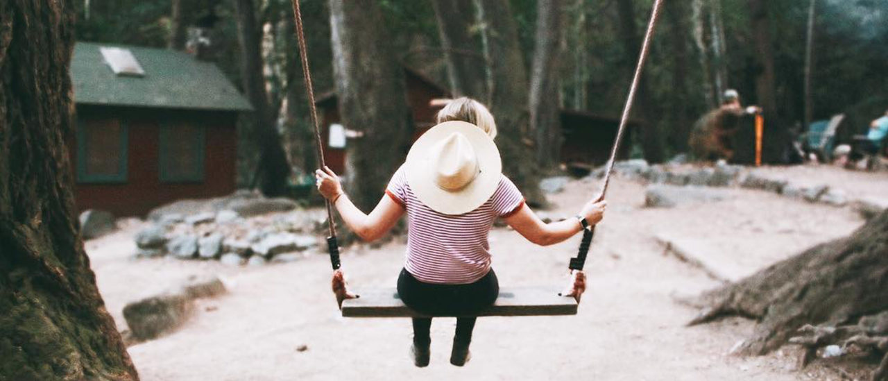 Woman Enjoying the Big Swing at Sturtevant Camp